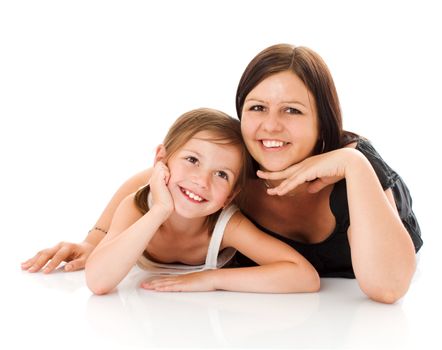 Mother and daughter posing together isolated on white