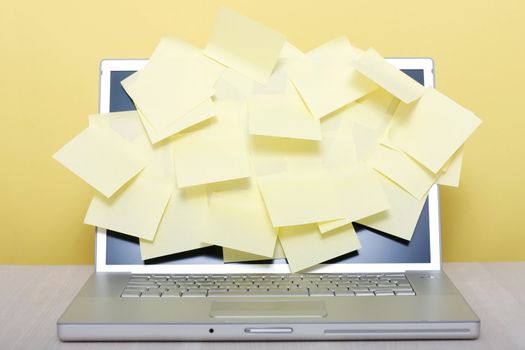 Yellow notes on a laptop screen