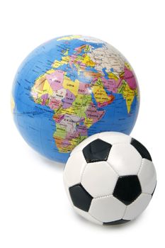 Toy soccer ball and globe - isolated on white background