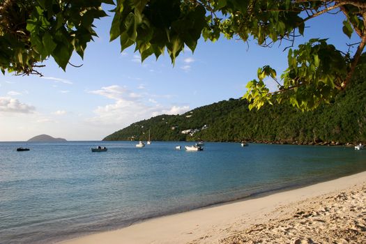 Water lapping the sandy beach on the island of St Thomas in the Caribbean