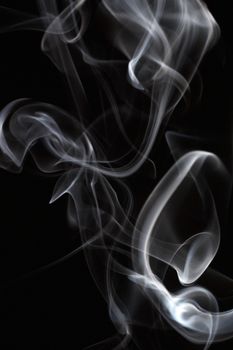 Abstract smoke curling and creating beautiful shapes