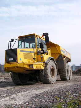 portrait of industrial dumpster on road