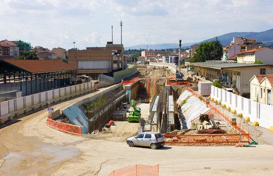 Panoramic view of a train station construction site.