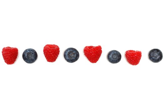 Blueberry on a background of raspberries