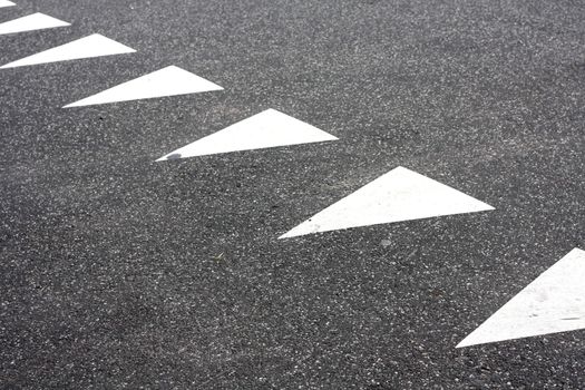 Triangular markings on a road
