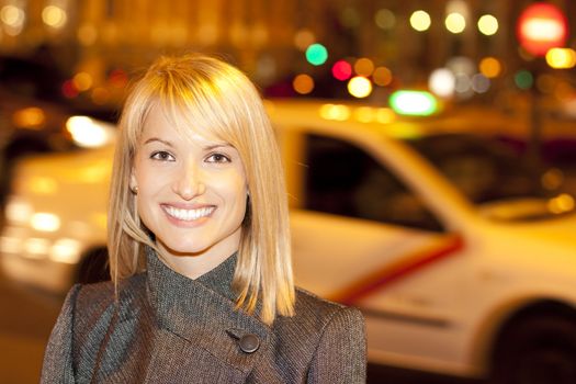 Portrait of a beautiful young lady on an lively friday night in a party capital - Madrid.