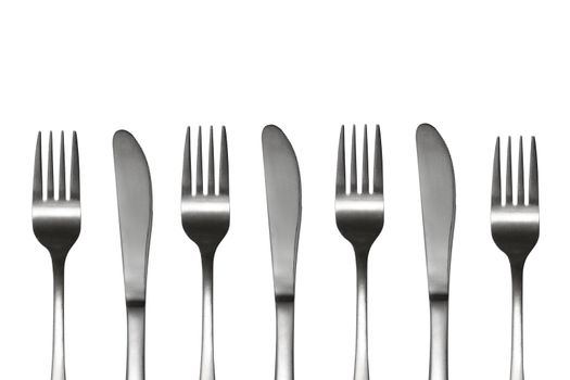 Forks and knives in a pattern