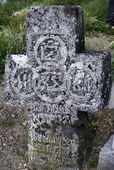 old cross in a romanian cemetery