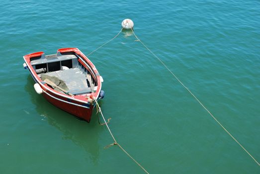 beautiful photo of a old fishing boat in Cascais, Portugal