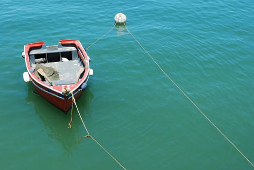 beautiful photo of a old fishing boat in Cascais, Portugal