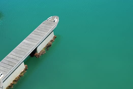 beautiful photo of a green water dock (landing stage)