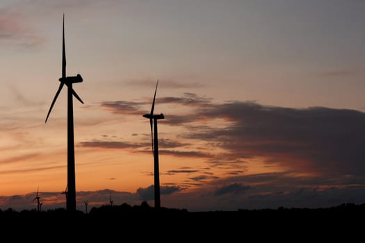 Windmills showing renewable energy in the evening