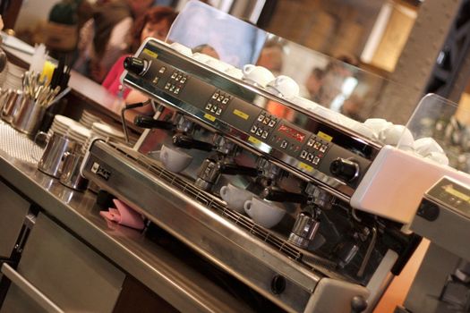 A professional espresso machine in a bar