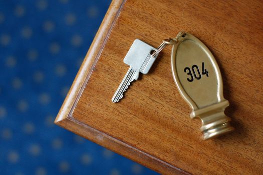 A hotel key on a table