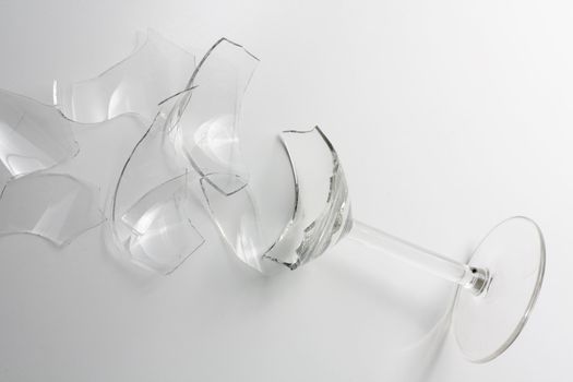 A shattered wine glass