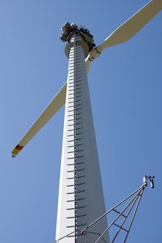 An high mountain wind turbine, pillar, ladder, anemometer