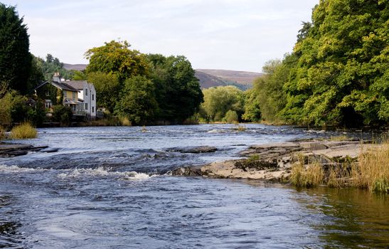 Wide view of the river through Llangollen in Wales