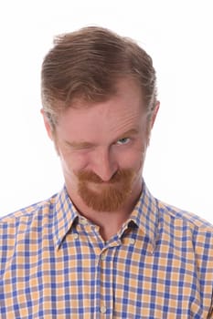 Portrait of winking man on white background