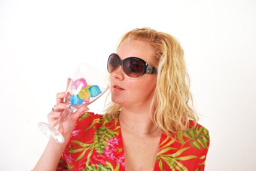 pretty girl in sunglasses enjoying a drink