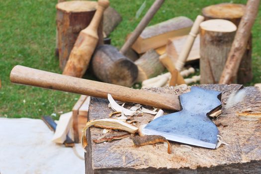 Axe on wooden chopping block