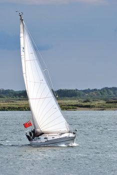 Yacht turning in wind