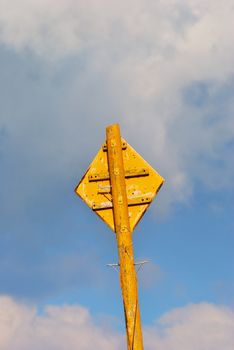 Yellow sign post