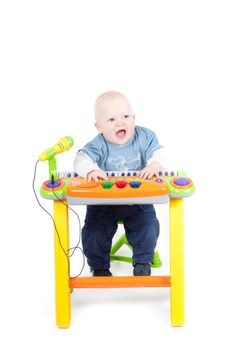 Studio shot of little boy, isolated on white