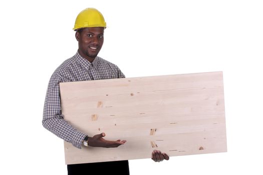 Young african american carpenter holding wooden plank on white background 