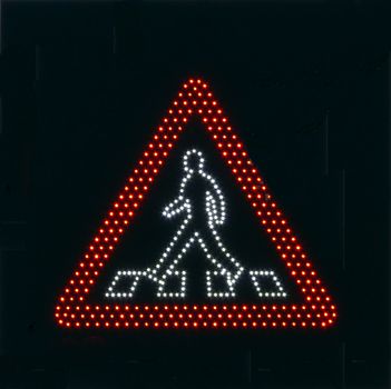 portrait of traffic sign warning for walking people