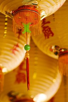 It is a close-up shot of tassel in chinese lantern.