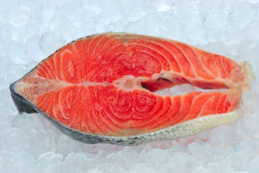 Fresh salmon steak on ice 