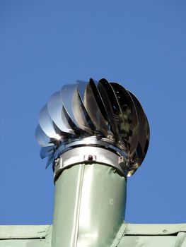 portrait of ventilation pipe in blue sky