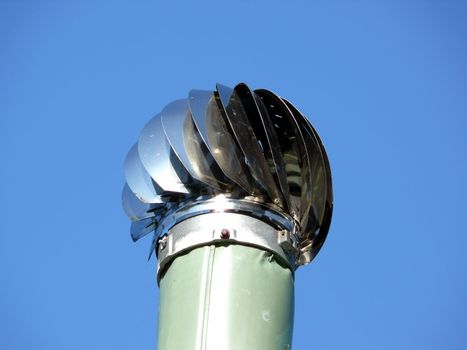 portrait of ventilation pipe in blue sky