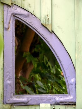 portrait of old window and garden