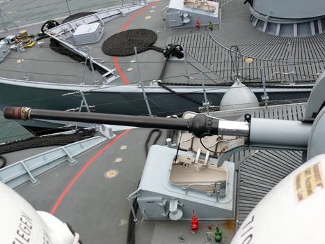 portrait of gun on a german navy ship in ocean