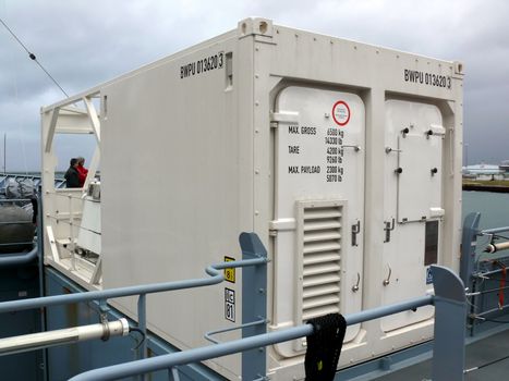 portrait of freeze container on a german navy ship in ocean