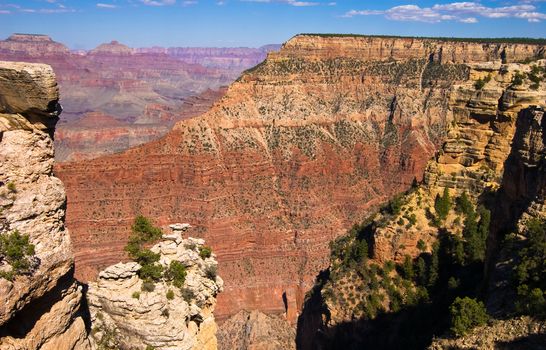 Overview of a Grand Canyon valley framed by rocks