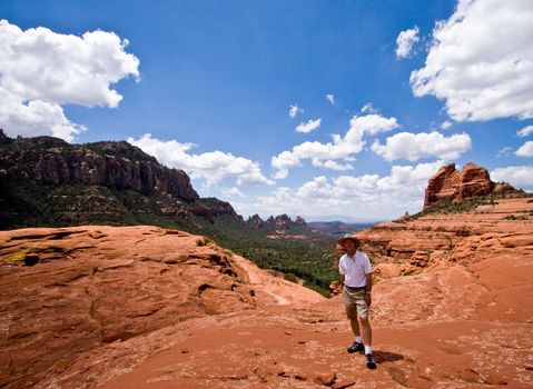 Single hiker in red rock area of Sedona facing the camera