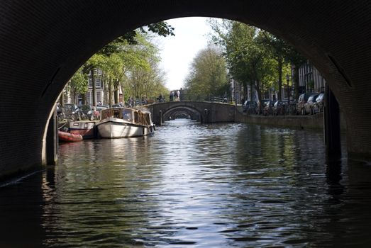 portrait of amsterdam canal bridges 