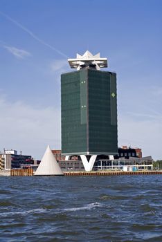 portrait of an amsterdam building seen from ocean