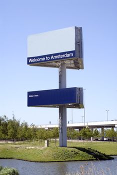 portrait of the Amsterdam welcome sign