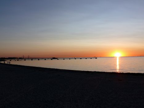 portrait of midnight sun infront sea landscape