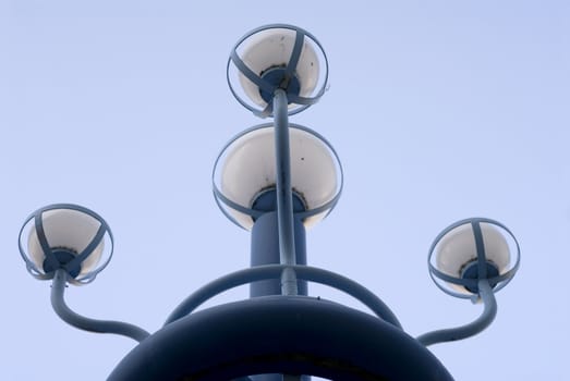 portrait of architecture lamps in blue sky