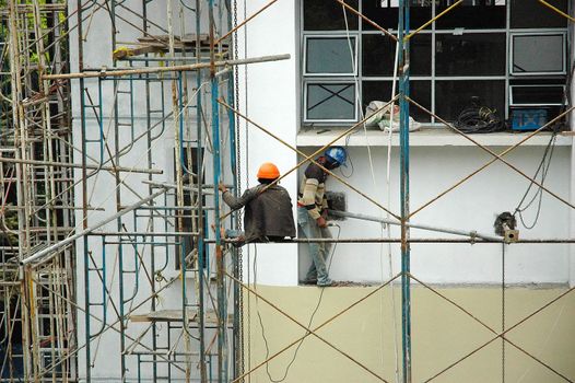 New building under construction with many metal bar