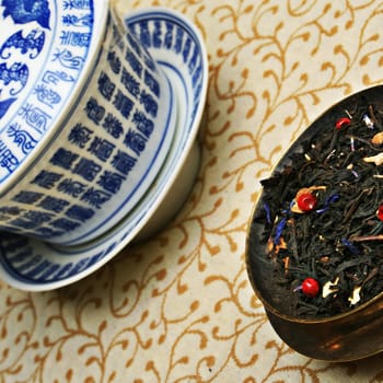 Antique chinese cup and a blend of tea leaves. More in my gallery
