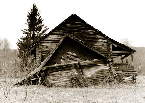 Old abandoned, collasping russian rural house