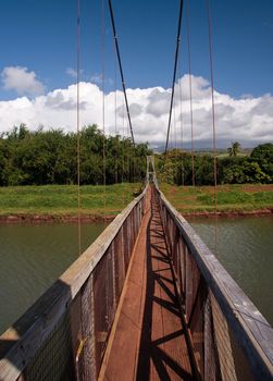 View down the walkway of the swinging suspension bridge at Hanapepe
