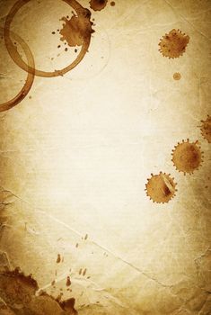 Classic vintage background. Old paper sheet with drops of coffee.