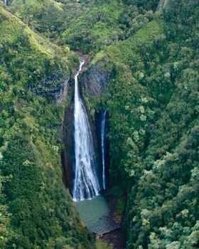 Waterfall from the air over Kauai