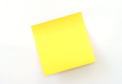 An isolated yellow sticky note on white background.